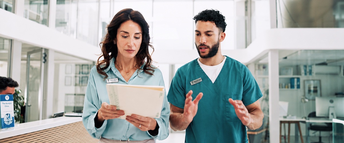 2 clinicians talking about patient recruitment