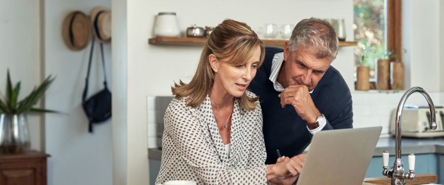 Older couple using a clinical trial matching software Older couple using a clinical trial matching software