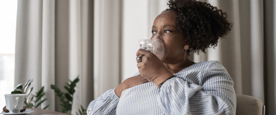 woman with asthma using nebulizer woman with asthma using nebulizer