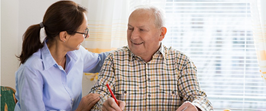 Man and woman doing activities to reduce memory loss.