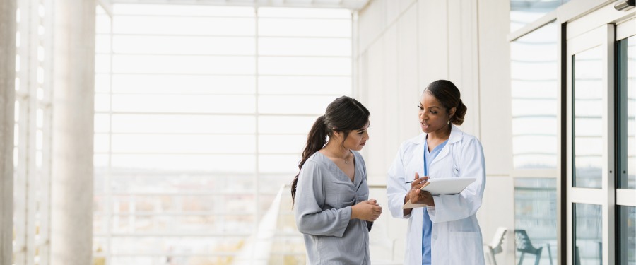Doctor and patient discussing clinical trial participation
