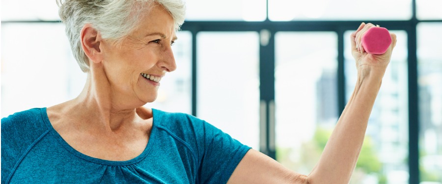 Female osteoporosis patient exercising Female osteoporosis patient exercising