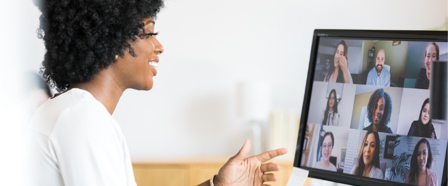 African American patient video chatting with an online community