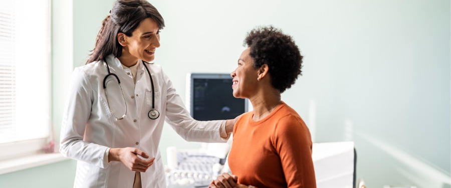 Doctor and patient in conversation Doctor and patient in conversation