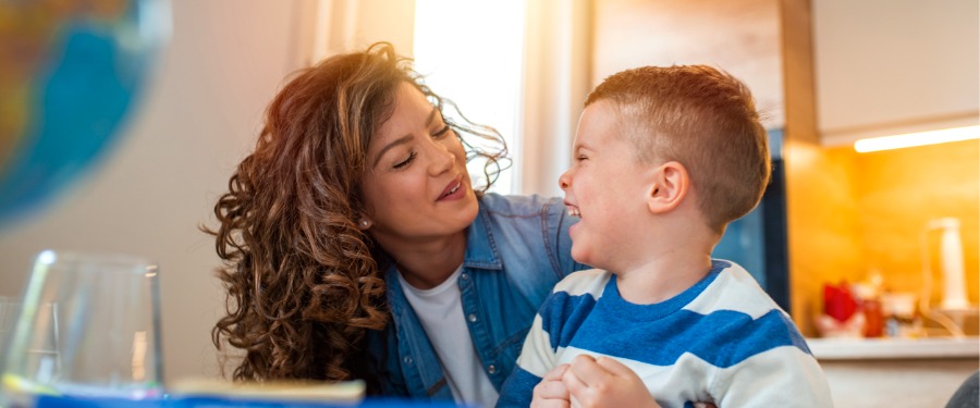 Mom and young boy discussing Hunter syndrome