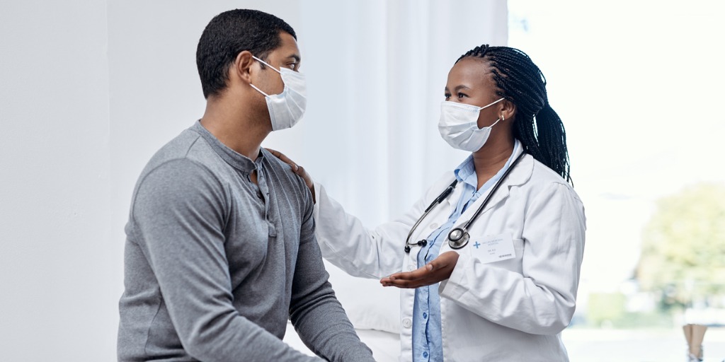 Doctor having a consultation with a patient Doctor having a consultation with a patient
