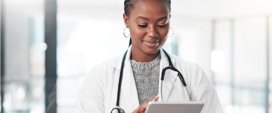 Female doctor using tablet for human factor clinical trial recruitment
