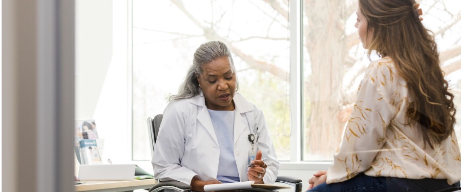 Doctor and patient discussing colon cancer diagnosis