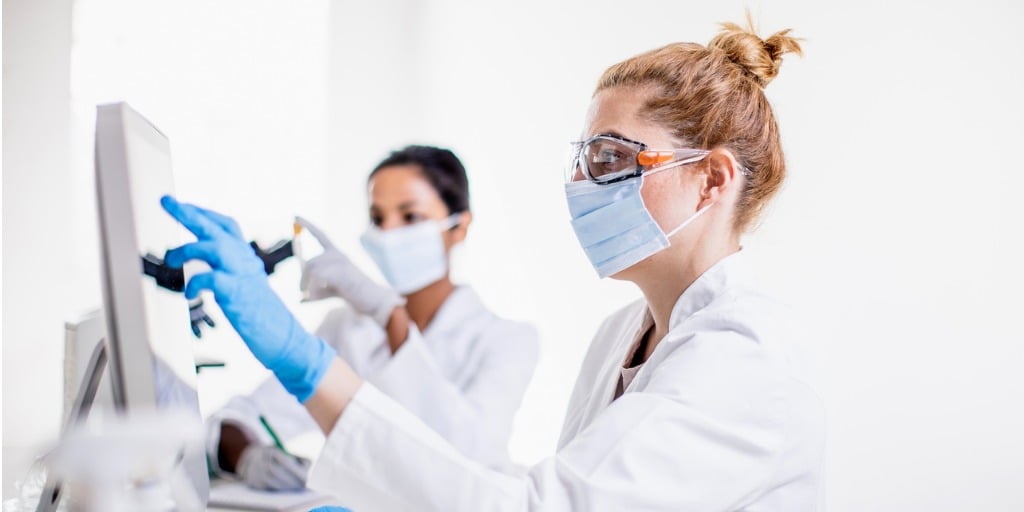 Woman looking up clinical trial statistics