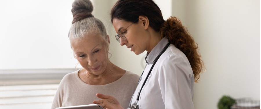 Doctor explaining patient reported outcomes in clinical trials